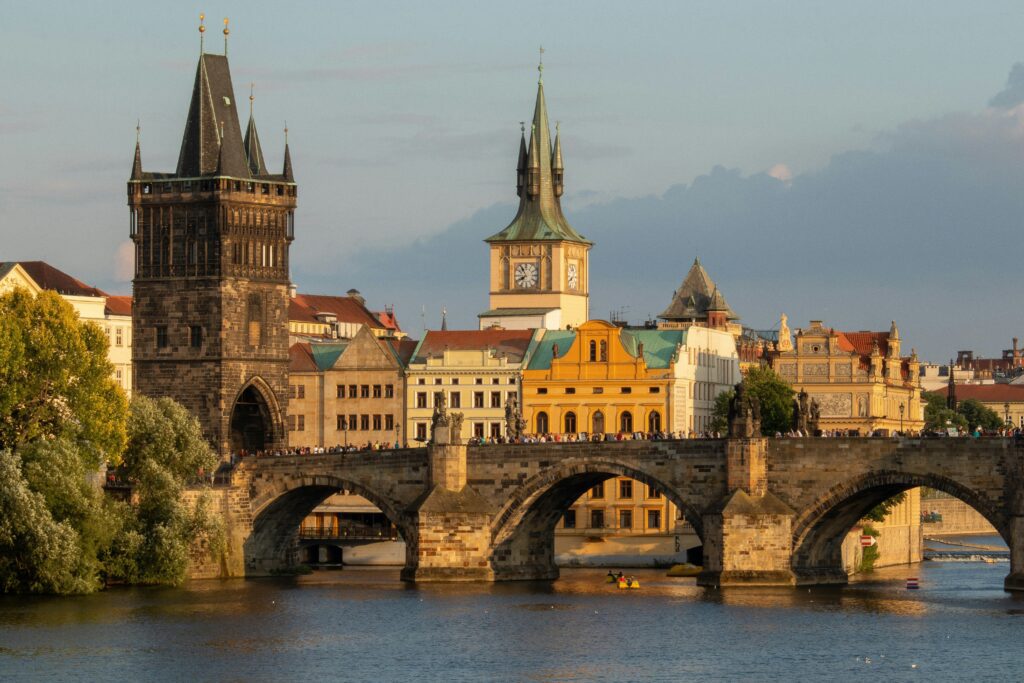 Prague Travel Guide: Picture of charles bridge and a  gun powder tower